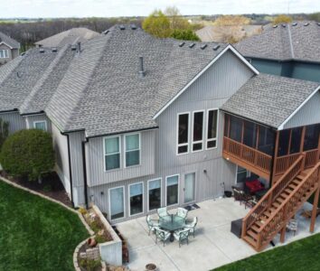 Asphalt shingle roofing on two-story home in Kansas City, MO