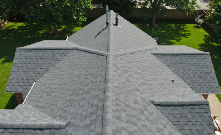 Residential house roof with asphalt shingles overhead view in Kansas City, MO