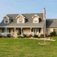 Asphalt shingle roofing on elegant two-story home in Lenexa, KS